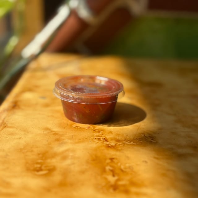 2oz Orden Salsa Picante. (Side).